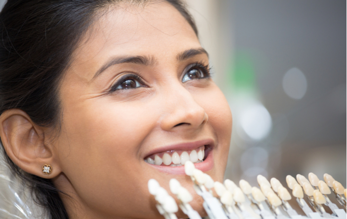 woman at the dentist being fitted for veneers